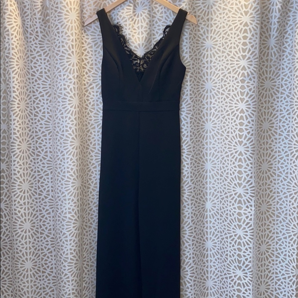 Black Jumpsuit with deep cut lace